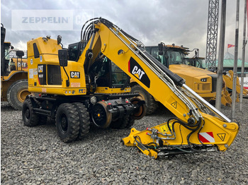 מחפר CATERPILLAR M323F